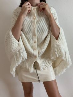 Vintage Poncho 100% Acrylic Fiber One size Two stains ( see pictures) Casual Cream Poncho For Fall, Chic White Cape For Fall, Chic White Poncho For Fall, Chic White Fall Poncho, White Long Sleeve Cape For Fall, Cream Long Sleeve Poncho For Fall, Cream Long Sleeve Fall Poncho, Spring Cream Cape, Cream Cape For Fall