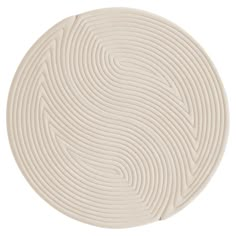 a white circular object with wavy lines on the center and bottom, as if it were made out of paper