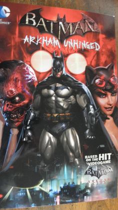 the batman arkham unhinged comic book on a wooden table with an image of two