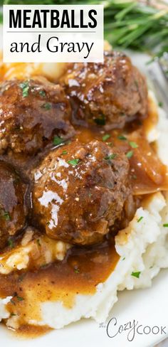 meatballs and gravy on top of mashed potatoes