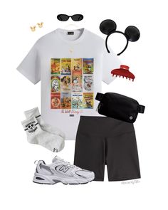 a white shirt, black shorts and mickey mouse ear headbands are on display