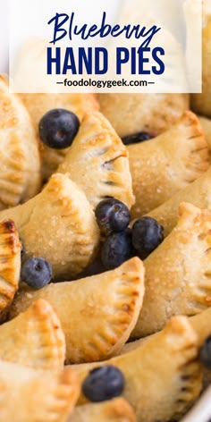 blueberry hand pies in a white bowl with text overlay reading blueberry hand pies