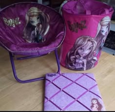 two children's chairs, one pink and one purple with barbie dolls on them