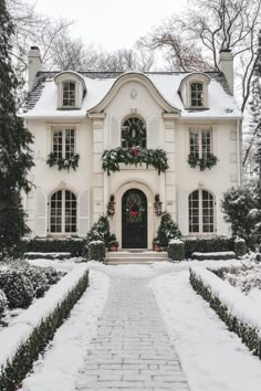 French White Brick House, Beautiful White Homes Exterior, French Dormer Windows, Tudor Home Christmas Decor Exterior, Christmas Farmhouse Exterior, French Colonial House Exterior, Christmas House Exterior Decoration, Symmetrical House Exterior, Traditional Homes Exterior