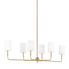 a brass chandelier with six white shades on the bottom and one light in the middle