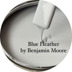 blue heather by benjamin moore logo on the bottom of a paint can