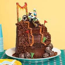 a birthday cake with dirt bike on top