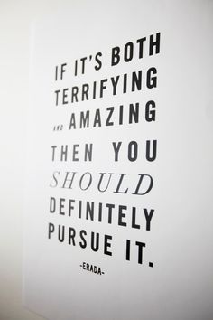 a white wall with a black and white quote on it that reads if its both terrifying and amazing then you should definitely pursue it