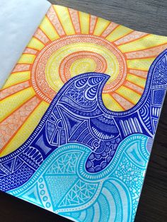 an elephant is painted on top of a piece of paper with the sun in the background