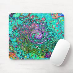 a mouse pad with a colorful swirl design on it