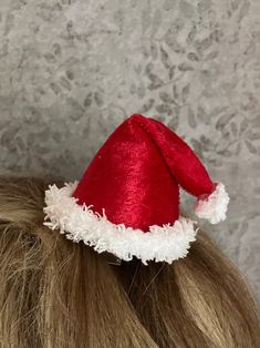 "My handcrafted mini Santa Hat is easy to either clip into hair or add to your plastic or metal headband for quick, holiday charm. Available in either traditional red or festive green, the hat is made from panne \"velvet\" and fur-like trim.  It's lightweight and compact.  Enjoy wearing your seasonal hat without worry about traditional holiday \"hat hair\" once it's removed!   Choose the attachment device that works best for you:  an alligator clip or a slide-thru casing (this allows you to slid Mini Santa Hat, Metal Headband, Holiday Hats, Hat Hair, Metal Headbands, Fun Size, Unique Ornament, Green Christmas, Holiday Tree