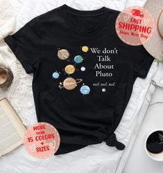 We Don't Talk About Pluto Shirt Gift For Space Lover, Cute Astronomy Shirt, Solar System Shirt, Funny Science Shirt, Trendy Planet Shirt Hi There!  We use one of the best quality t-shirt brands out there! Bella Canvas, Gildan Soft Style, Super comfy, cozy and oh so soft! :  * All Solid Color T-SHIRTS are 100% Cotton.  * All Heather Color T-SHIRTS and All Sweatshirts are combined with cotton and poly mix which makes them extra soft and so comfortable!s are combined with cotton and poly mix which makes them extra soft and so comfortable! * All of our shirts are Unisex and our sizes are Retail Fit. Taped shoulder to shoulder and side seamed. * Size tag labels are the free tear away kind so say bye to that unwanted itching!  So how will you order? 1- Choose Size 2- Choose Color 3- Add any pers Planet Shirt, Funny Science Shirts, Science Shirts, Funny Science, Space Lovers, We Dont Talk, Science Humor, Comfy Cozy, Quality T Shirts