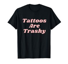 PRICES MAY VARY. Express your love for tattoos with our "Tattoos Are Trashy" tee – a witty statement for those who have tattoos! Cute Y2k Funny tee. great present to friends with tattoos a Tattoo Artist, Inked or someone who loves tattoo art. a humorous tattoo hater tee. Add this sarcastic tattoo humor tee to your wardrobe today and wear it with confidence – because you love tattoos! Perfect for any tattoo lovers, tattoo haters, or tattoo artists for Parties, or as a Funny Valentine's Day presen Tattoo Humor, Loves Tattoo, Small Sayings, Sayings On Shirts, Lovers Tattoo, Tattoo T Shirt, Sarcastic Tees, Tattoo T Shirts, Trashy Y2k