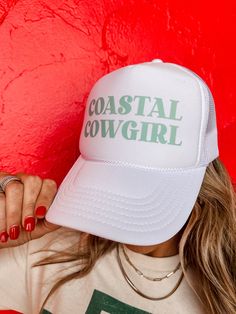 Show off your unique style with our Coastal Cowgirl trucker hat! This white hat features a pop of turquoise with the words "Coastal Cowgirl" emblazoned across the front. Perfect for a day at the beach or a night out with friends, this hat will add a touch of fun to any outfit. Yee-haw! Lined Trucker style Snapback design Cowboy Bachelorette Party, Cowboy Bachelorette, Cowgirl Accessories, Night Out With Friends, Yee Haw, Coastal Cowgirl, White Hat, Beach Hat, A Day At The Beach