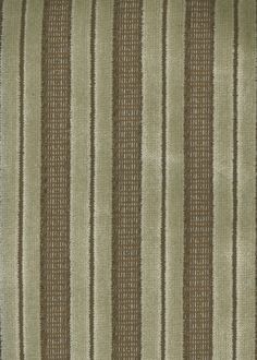 an area rug with brown and white stripes