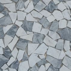 white and grey marble mosaic tiles on the floor