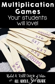 several wooden spoons with writing on them and the words, multiplication games your students will love