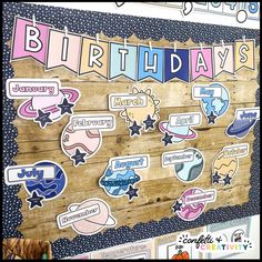 a wooden board with lots of stickers on it that says, happy birthdays