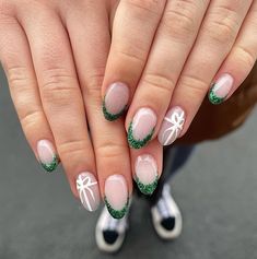 Cute Nail Designs Glitter, Mid Length Christmas Nails, Nail Ideas Christmas Green, Short Oval Nails Designs Christmas, Short Oval Winter Nails, Nursing Graduation Nail Designs, Christmas Nails Acrylic Oval, Short Oval Nails Acrylic Christmas, Green French Tip Nails Christmas