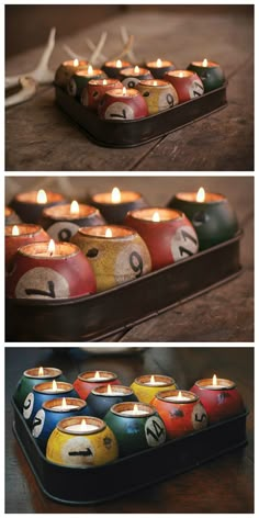 candles are lined up in the shape of billiard's pool balls with numbers painted on them