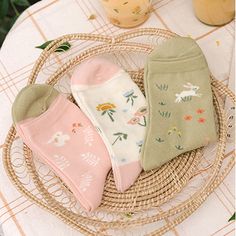 A set of 3 pairs of crew length socks featuring rabbits and flowers in a sweet pastel palette. Cute Cotton Socks For Spring, Spring Cotton Socks Gift, Spring Gift Cotton Socks, Cotton Socks For Spring Gift, Pink Socks For Spring, Cute Green Socks For Spring, Cute Pink Spring Socks, Pink Sweet Socks For Spring, Cute Soft Pink Socks