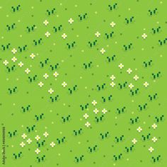 a green background with small white flowers and dots in the center, all on one side