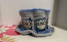 Stay stylish with our unique Beer Can Crochet Hat! Each hat is handcrafted with care and attention to detail, making them a one-of-a-kind addition to your wardrobe. The beer can design adds a touch of quirkiness to your outfit, making it a great conversation starter at parties and events. Made with high-quality yarn, this hat is both cozy and durable. Whether you're a beer lover or just appreciate a fun and creative accessory, our Beer Can Crochet Hat is the perfect choice for anyone looking to Beer Can Hat, Crochet Beer, Beer Can Design, Bonnet Au Crochet, Crochet Unique, Bonnet Crochet, Creative Accessories, Costume Hats, Cute Hats