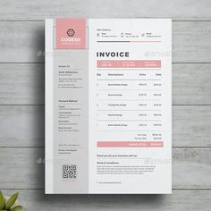 an invoice is shown on top of a table with a plant next to it