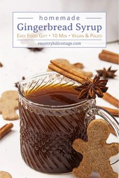 homemade gingerbread syrup in a glass mug with cinnamon stick and star anise