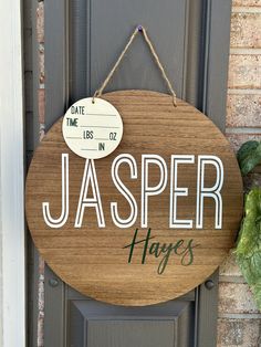 a wooden sign hanging on the side of a door saying, jasper haves