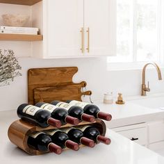 a wine rack in the middle of a kitchen counter