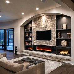 modern living room with fireplace and built - in entertainment center