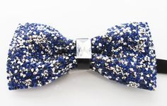 Beautiful pre-tied and adjustable double tiered banded bow tie Crystal Beaded Will adjust from 13" through 20" neck. Bow dimensions 2.5" x 4.5". Adjustable Blue Standard Bow Tie, Adjustable Blue Standard Tie Bow, Blue Adjustable Standard Tie Bow, Adjustable Blue Bow With Bow Tie Back, Blue Adjustable Bow With Ties, Adjustable Blue Bow With Ties, Adjustable Blue Bow Ties, Adjustable Blue Bow With Ribbon, Adjustable Butterfly Knot Bow Tie For Party