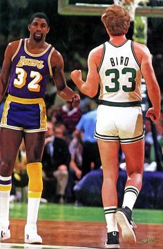 two basketball players are shaking hands on the court