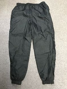 Men’s (or Unisex) Lined Pants For Jogging, Skiing, Workouts in Cool/Cold Weather, Etc, Size Medium, Black, Nice. Label: CLIMATE ZONE Fabric: Shell - 100% Nylon, Lining: 65% Polyester, 35% Cotton Waistband is elastic plus also has a drawstring These pants are pull-up (no fly) 7" zippers are on the ends of each pant leg (for ski boots, etc.) End of each pant leg also has elastic. The outer fabric (shell) feels like it is water repellent. Inside lining feels soft and comfortable. Outer fabric has a Black Winter Hiking Bottoms, Black Bottoms With Pockets For Ski Season, Sporty Black Parachute Pants For Hiking, Black Casual Skiing Bottoms, Casual Black Skiing Bottoms, Full-length Black Pants For Winter Sports, Casual Black Pants For Ski Season, Black Full-length Pants For Winter Sports, Casual Black Bottoms For Skiing