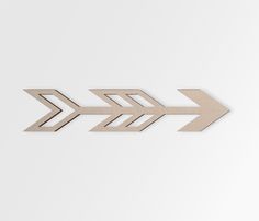 an arrow made out of wood on a white background