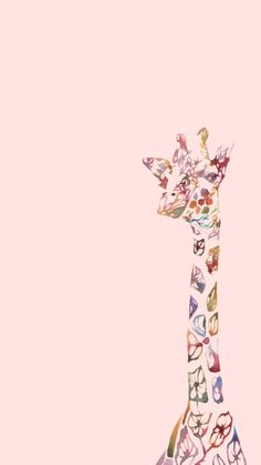 a giraffe is standing in front of a pink background with letters all over it