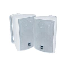 two white speakers sitting next to each other