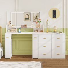 a bedroom with green walls, white furniture and a mirror on the wall above it