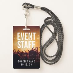 a lanyard with a name tag attached to it that says event staff on the front