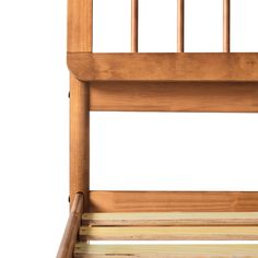 a wooden bed frame with slatted rails