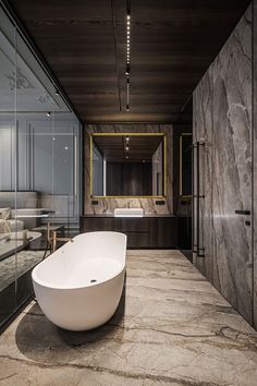 a large bathtub sitting in the middle of a bathroom