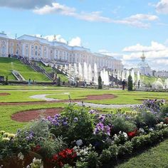 the gardens are full of colorful flowers and fountains