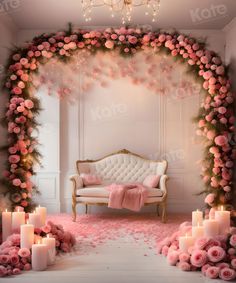 a room decorated with pink flowers and candles