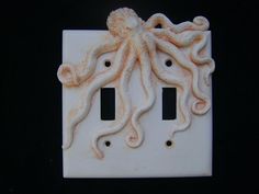 an octopus light switch cover is shown