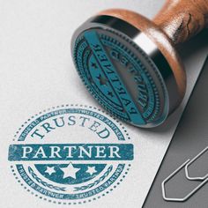 a rubber stamp with the words trusted partner on it