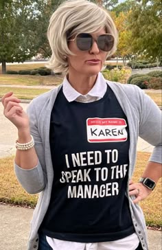 a woman wearing sunglasses and an apron with the words i need to speak to the manager on it