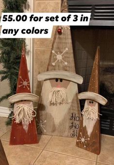 three wooden gnomes sitting next to each other in front of a fireplace with the words $ 5 00 for set of 3 in any colors