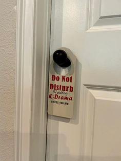 a door handle with a do not disturb sign on it