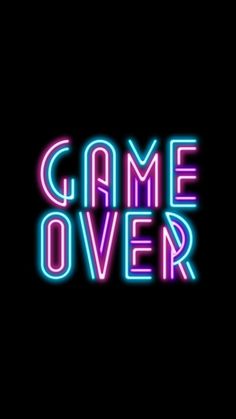 the words game over are lit up against a black background